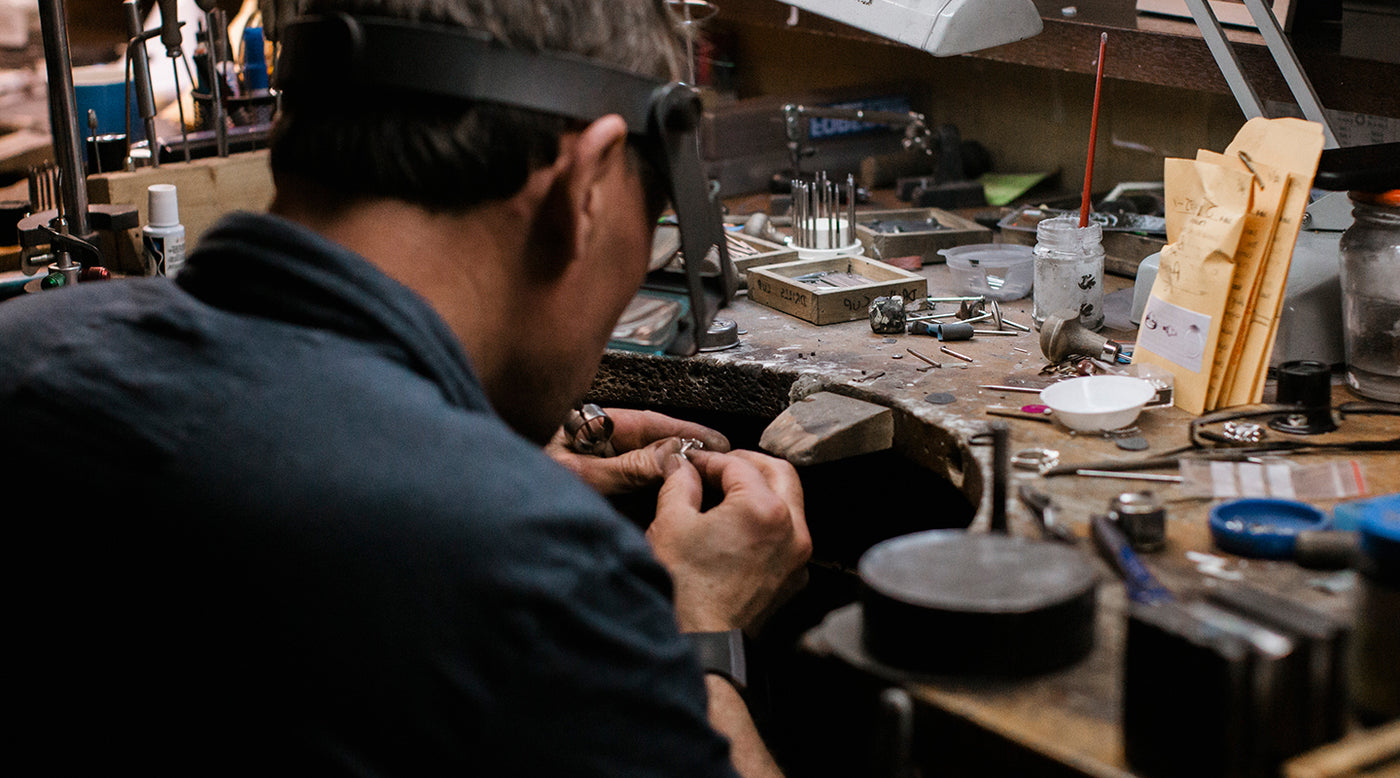 A Charles Rose jeweller at the workbench